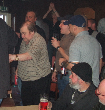 Bernard Manning arriving on stage at the Variety Club Notts